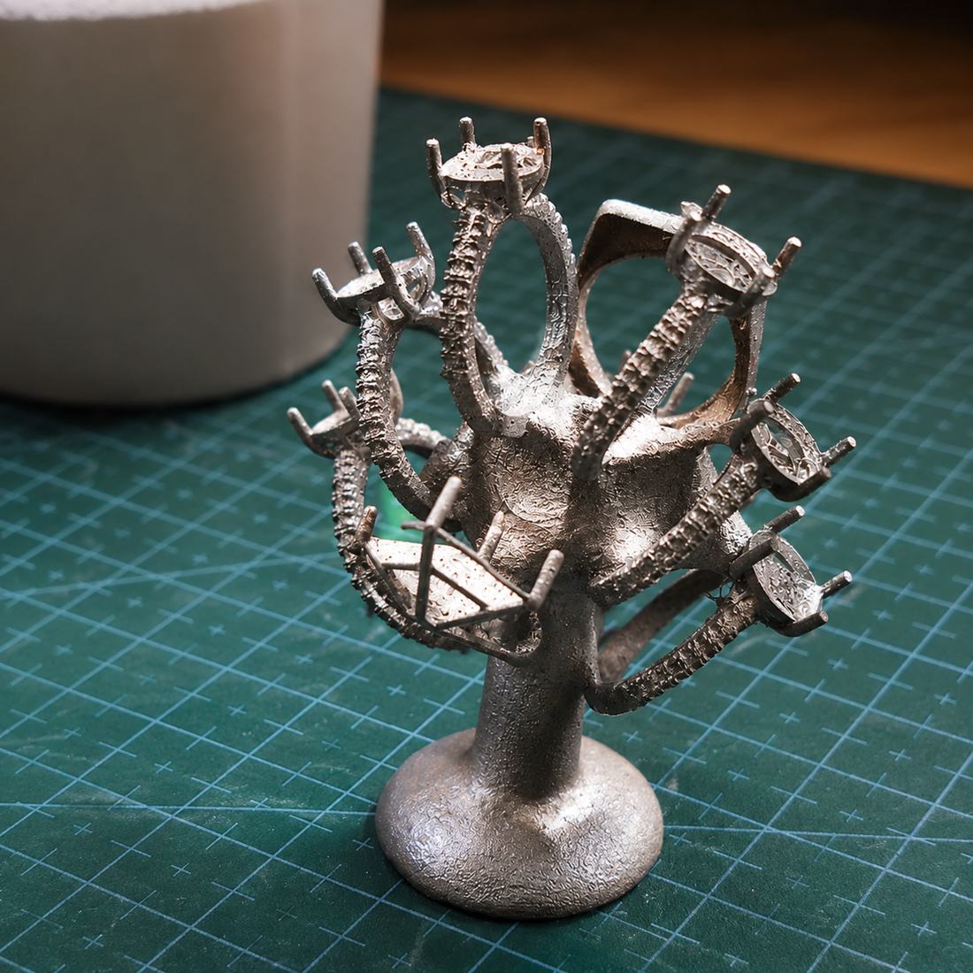 A sprue tree of casted jewelry made with the lost wax casting method. 