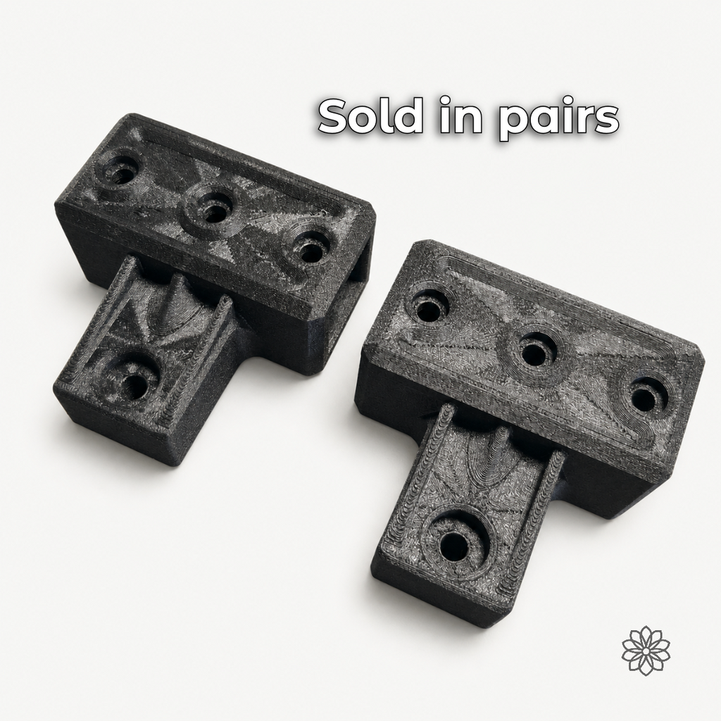 Pair of 2020 mounting brackets with recessed holes shown on a light background.