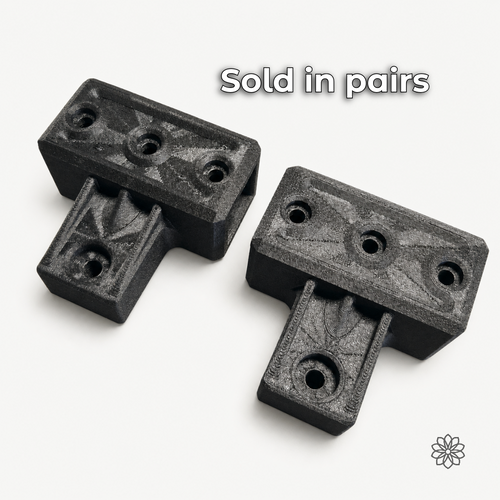 Pair of 2020 mounting brackets with recessed holes shown on a light background.