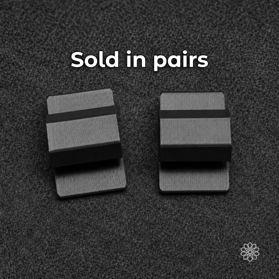 Pair of black RTT cable mounts shown on a dark textured surface.