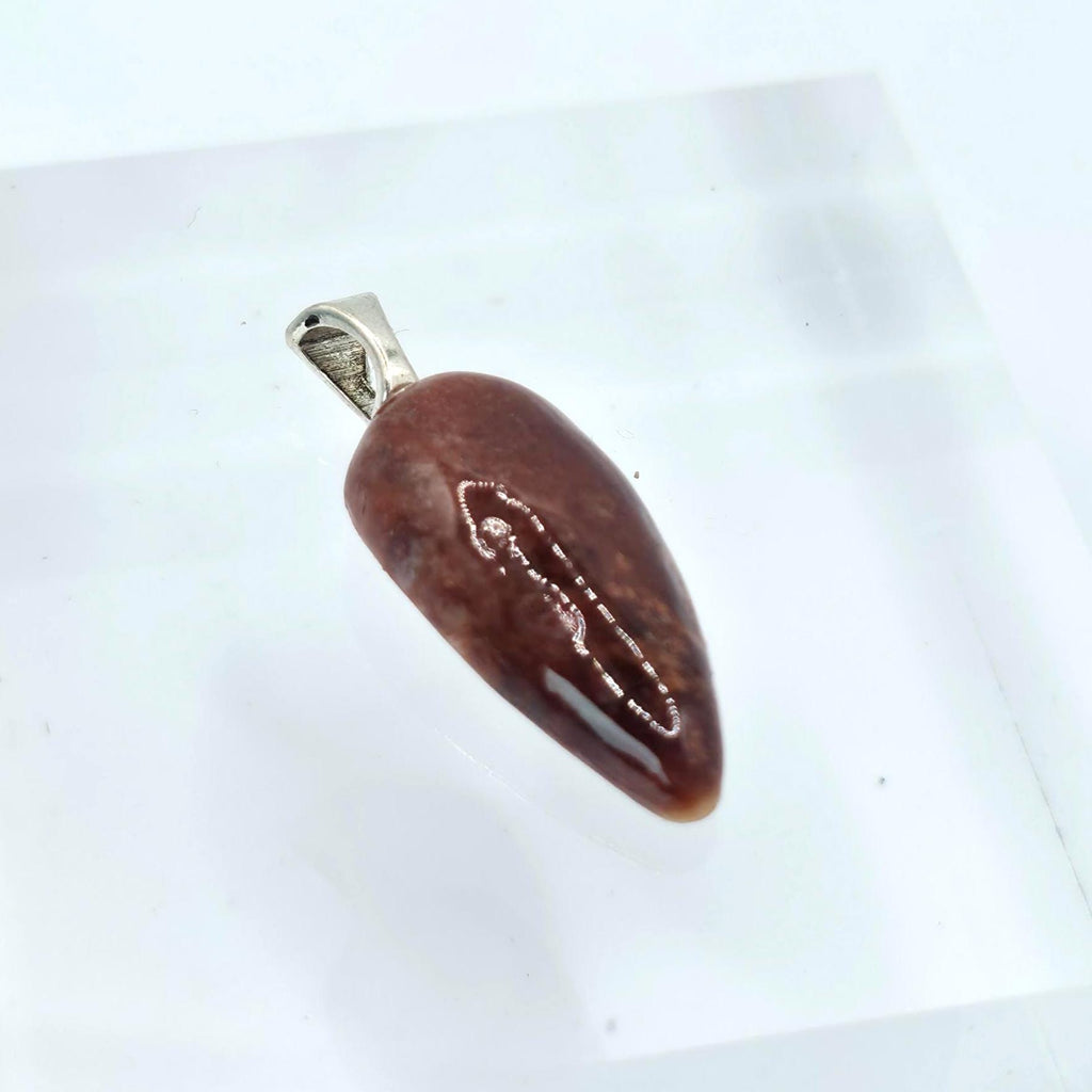 Red River Agate Pendant — front view on model