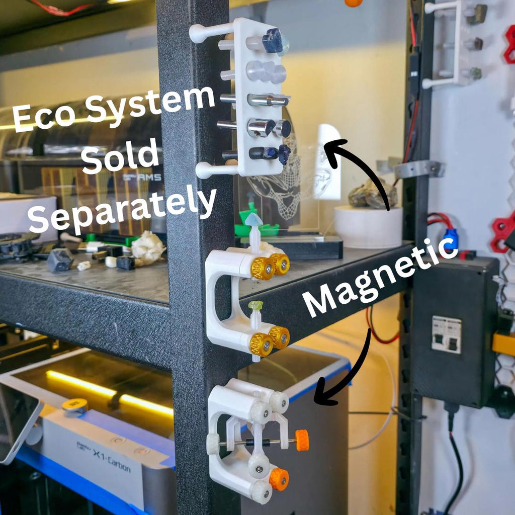 Magnetic dop trays mounted vertically to a steel surface using embedded magnets. The trays hold stones securely while freeing bench space, demonstrating magnetic attachment for carts, tool racks, or metal workstations in lapidary and jewelry workshops.