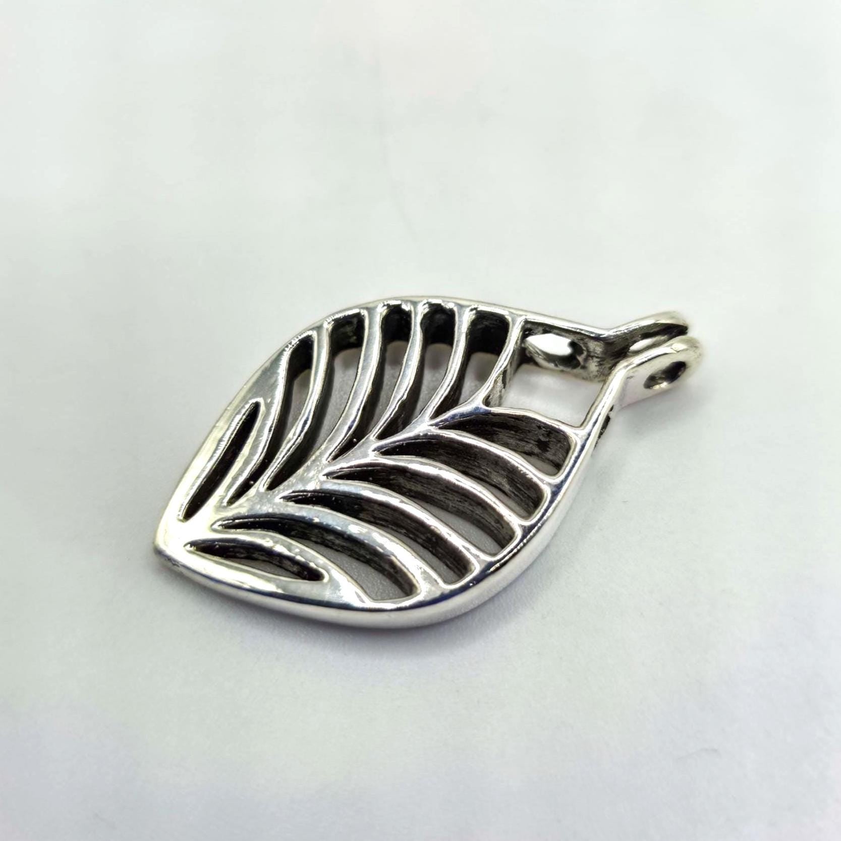 side view to show pendant interior and raw interior finish