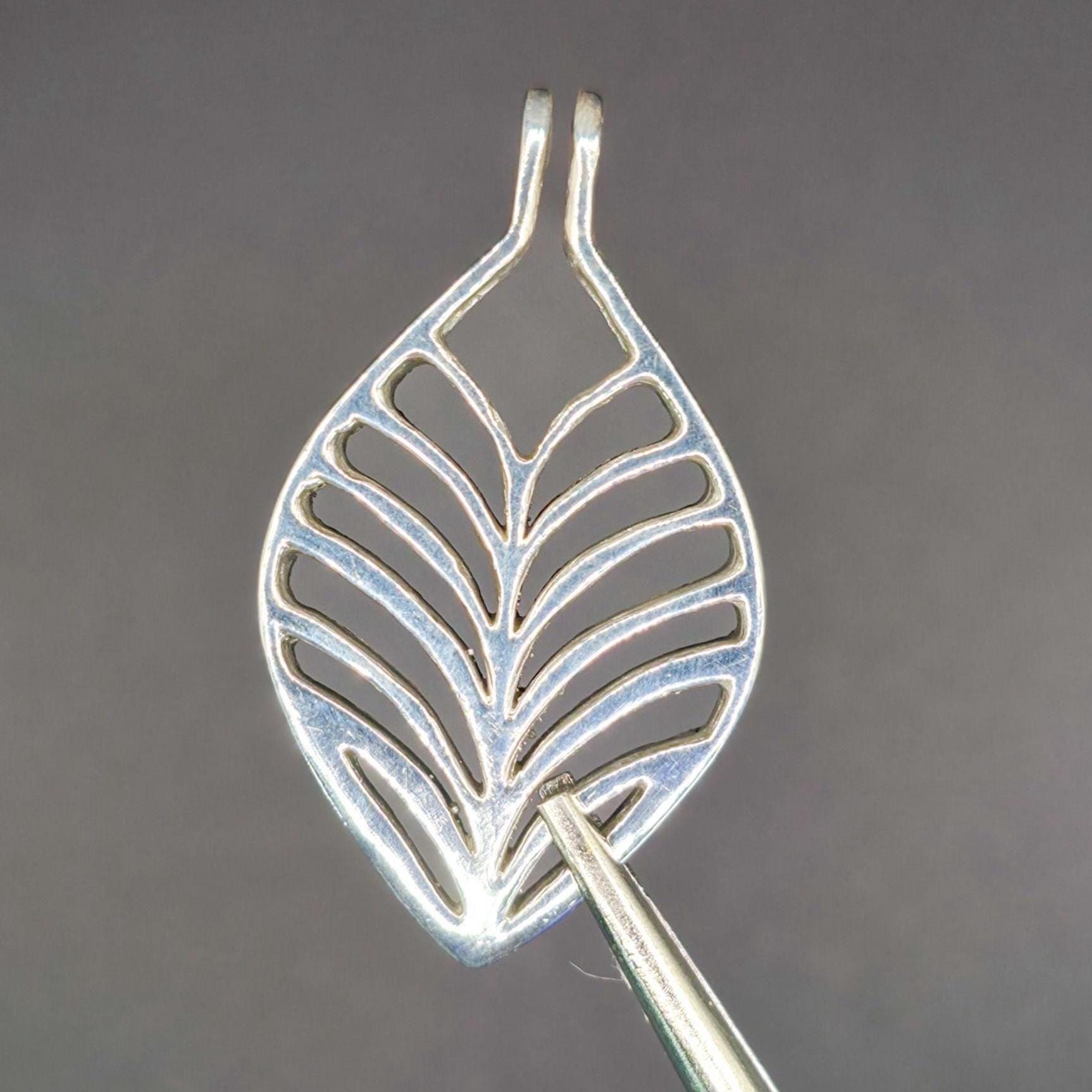 Sterling Silver Pendant — High polished silver examiners view front