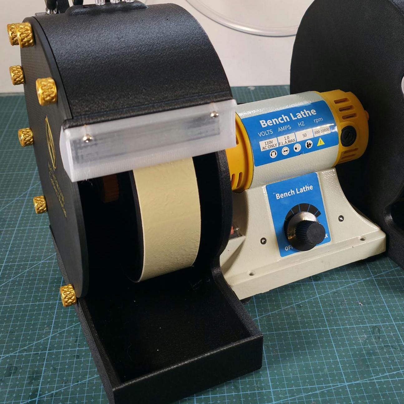 image features a close up of the cut n cab v2 Carbon Pro with a 6 inch diamond resin nova wheel installed using the adapters provided in the listing. These adapters are designed to provide a balanced approach to modifying affordable equipment to use industry standard abrassive wheels in both dry and wet grinding settup.