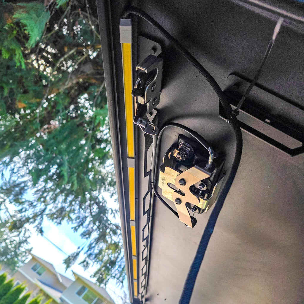 image features a led bar light on a camper door featuring amber bug resistant lenses and zip tied wires for cable management