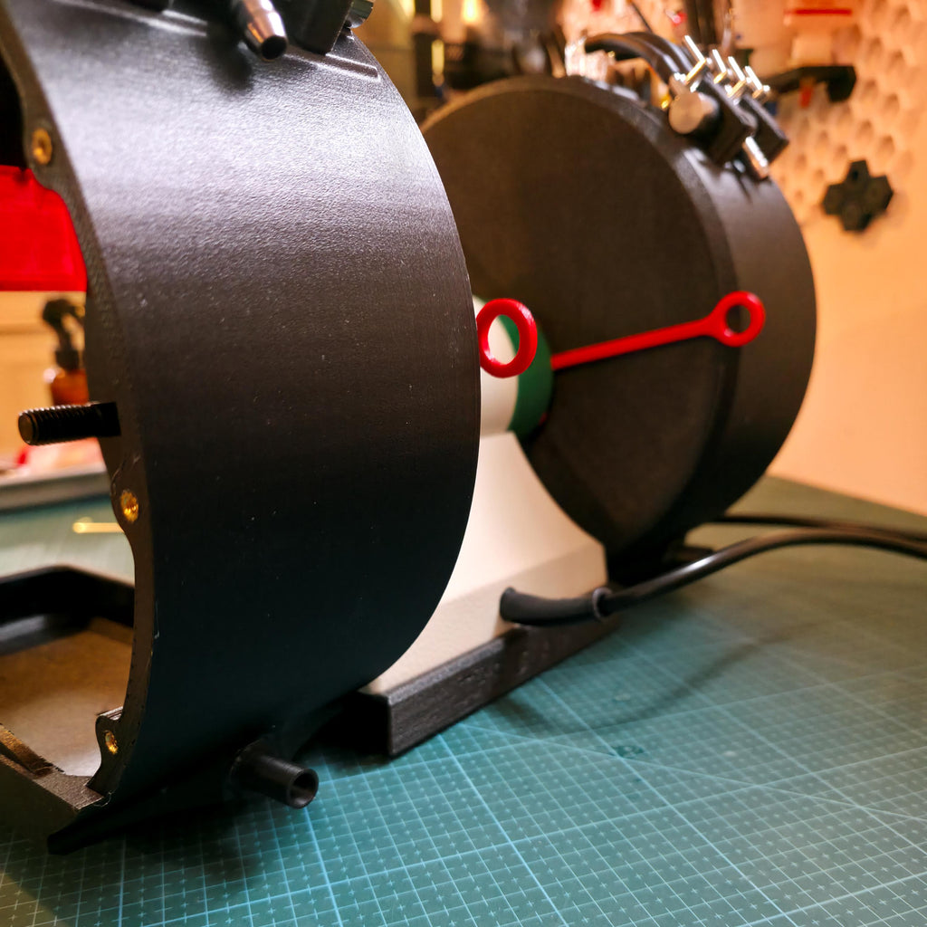 Side view of the Cut ’n Cab modular system featuring carbon fiber housings connected to the lathe motor mounted on the Quick Clamp Adapter base.