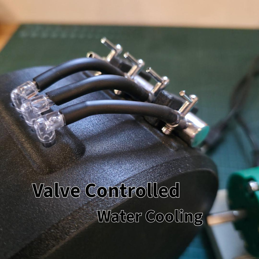Macro shot of the valve-controlled water system on the machine’s housing. Four adjustable flow valves connect to flexible tubing, allowing independent water regulation across abrasive wheels or cutting areas. Designed for precise coolant control and clean operation during extended grinding sessions.