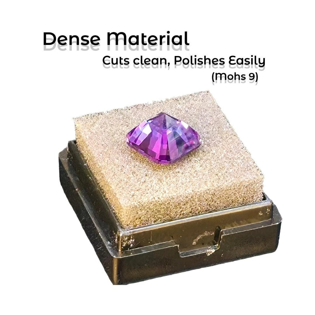 Faceted Aetherium Alexandrite gemstone on polishing sponge, showing bright pink-violet brilliance and sharp facet definition. Cuts clean, polishes easily—Mohs hardness 9. Perfect example of Aetherium’s dense lab-grown alexandrite for professional faceters.