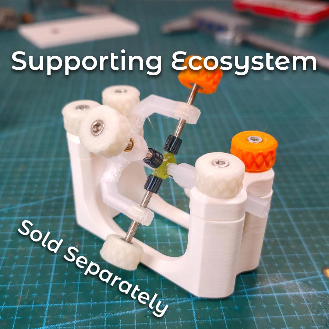 Gem Axis V3 seated in a white Daisy Lapidary base on a cutting mat, gripping a dop with visible green epoxy at the joint. Fine-thread M3 screws and TPU bushings are shown mid-adjustment for smooth, secure recentering after a slip or pop-off. On-image text: “Supporting Ecosystem • Sold Separately.” Demonstrates recovery workflow and yield preservation.