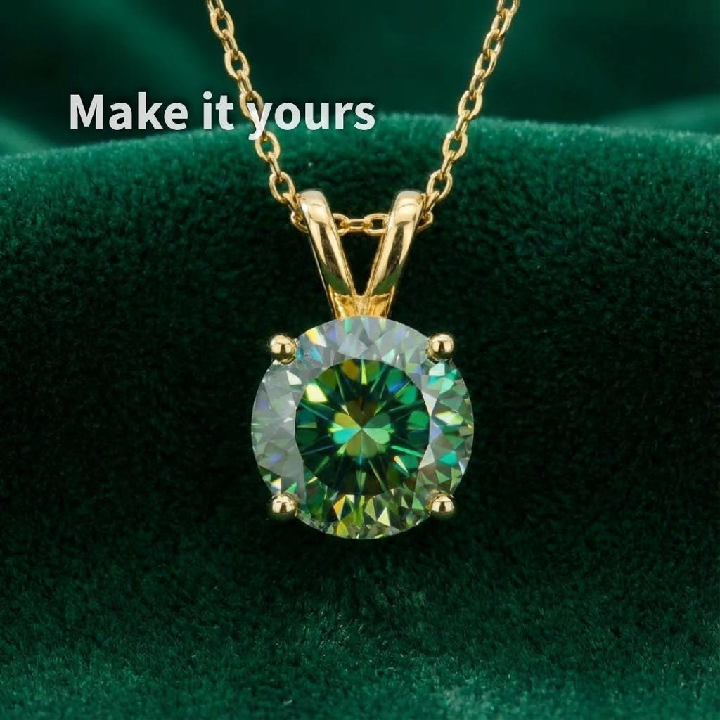 Emerald green round moissanite shown set in a gold pendant to demonstrate scale and design potential