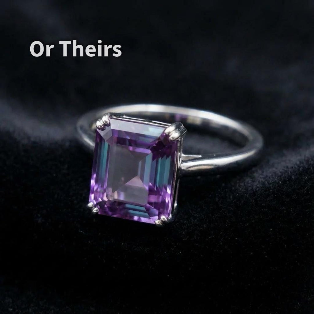 Alexandrite sapphire shown set in silver pendant for design inspiration, 6 ct Asscher cut stone with visible color shift from violet to teal, demonstrating scale and presence for custom jewelry commissions, stone sold separately.