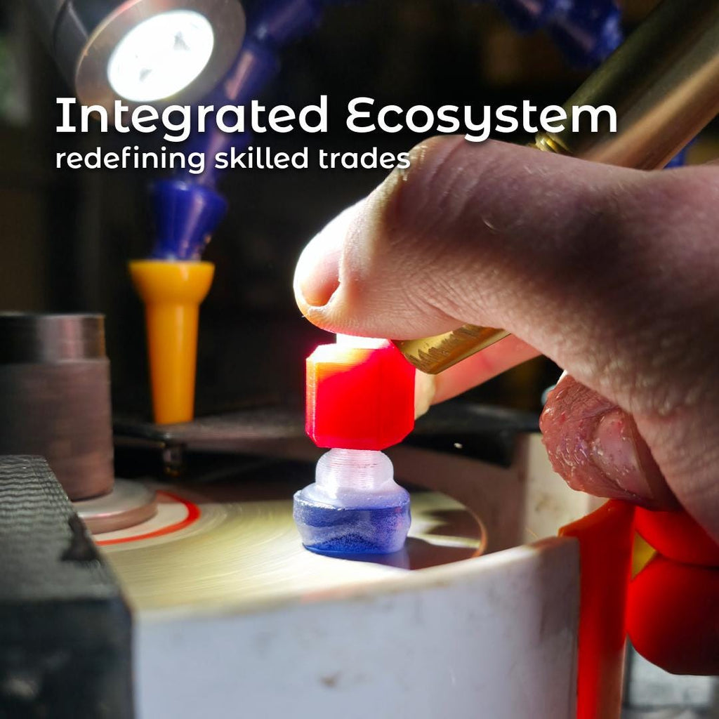 Hand holding the aetherium tabling adapter attached to a gemstone on the vevor faceting machine. Lighting emphasizes the grip, control, and integration with modern faceting and cabbing systems. Text reads “Integrated Ecosystem – redefining skilled trades,” reinforcing compatibility across Aetherium tools.