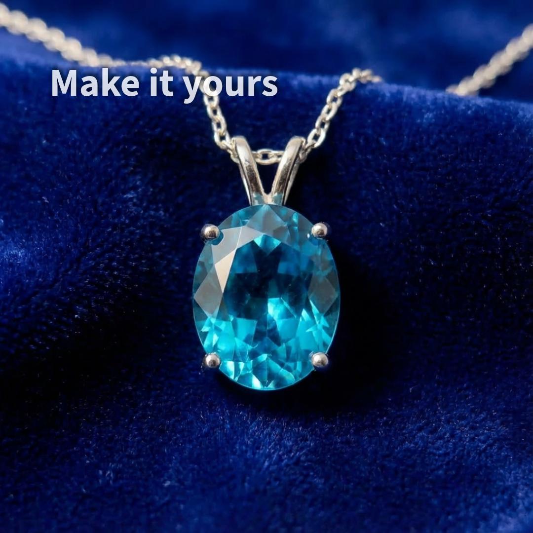“Oval blue sapphire set in a simple silver pendant on a fine chain, demonstrating scale and design potential. This image illustrates how the loose gemstone can be transformed into finished jewelry, supporting visualization for custom commissions and client design planning.”