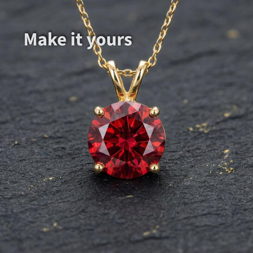 Ruby moissanite gemstone shown set in a gold pendant to demonstrate scale and jewelry potential. The 1 ct round Russian brilliant cut stone exhibits deep red color and strong sparkle. Image illustrates how this loose gemstone can be transformed into a finished custom necklace or heirloom piece.