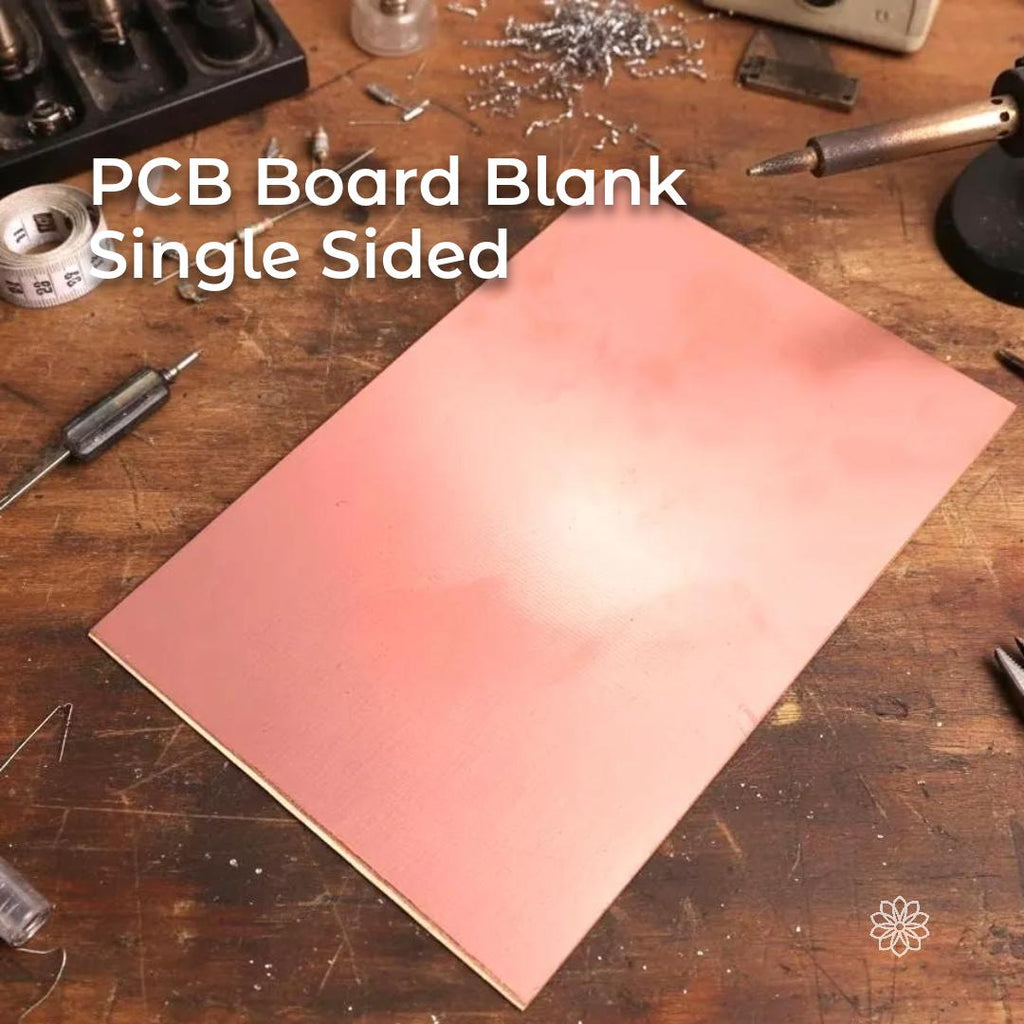 “A large copper-clad PCB blank placed on a workbench with a soldering iron, cutters, and scattered components nearby. The copper surface shows a light brushed texture typical of raw laminate prepared for PCB etching, CNC isolation routing, circuit prototyping, and electronics projects.”