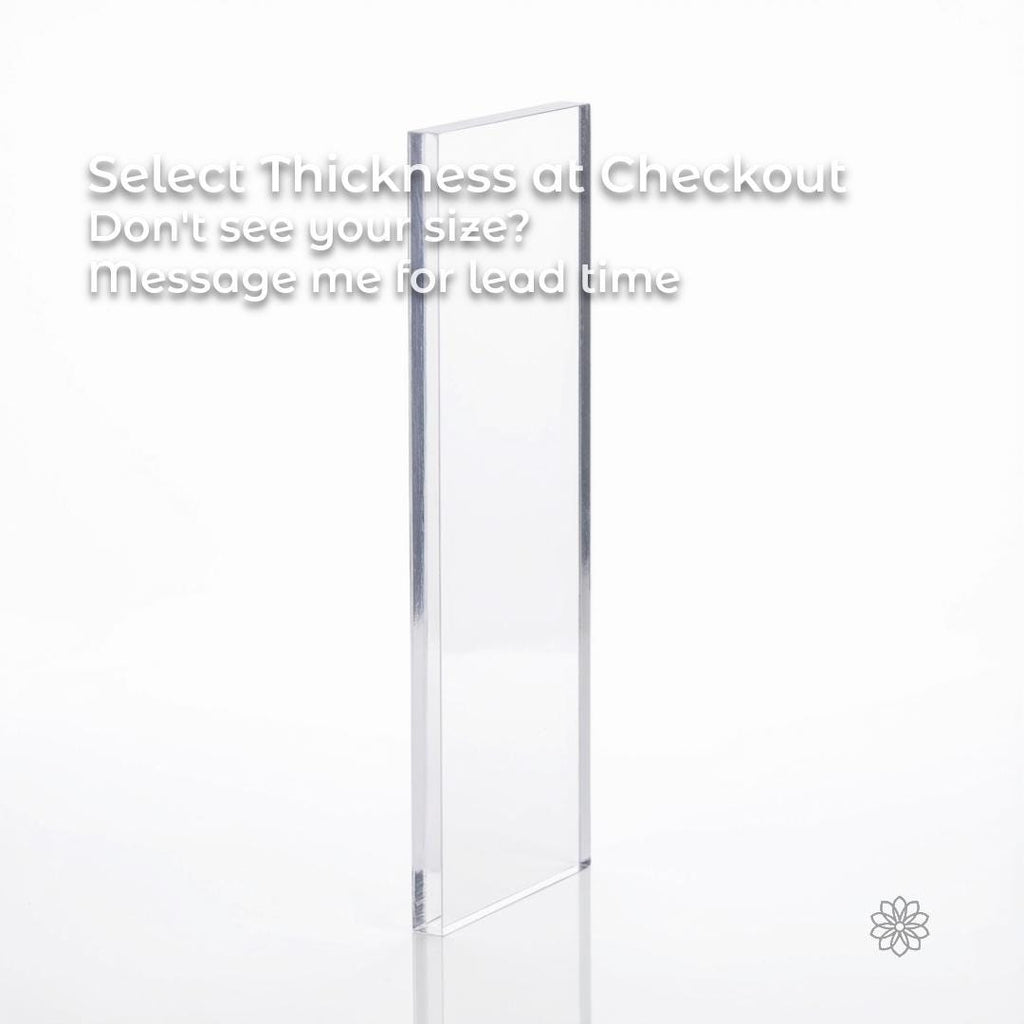 Clear polycarbonate sheet displayed vertically on a white background to emphasize material thickness and edge profile. The transparent plastic plate shows straight edges and uniform clarity, illustrating thickness selection at checkout and suitability for CNC machining, fabrication, and impact-resistant applications.