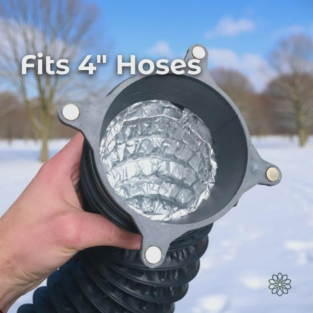 Vent Link magnetic heater duct adapter shown attached to a flexible 4-inch insulated heater hose, demonstrating compatibility with standard diesel heater ducting. The carbon fiber reinforced polycarbonate adapter features four embedded locking magnets around the flange, providing a secure, aligned connection for temporary heater airflow routing. On-image text reads “Fits 4 inch hoses.”