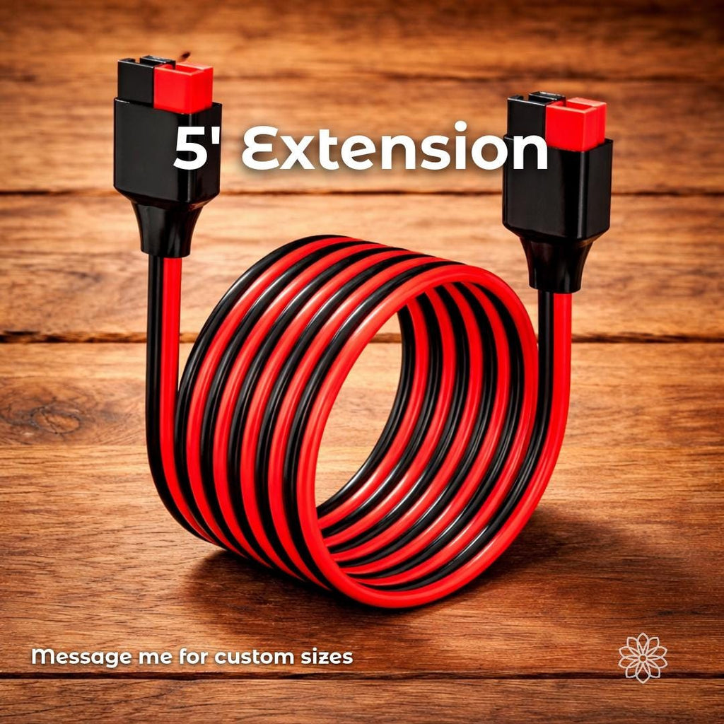 Five-inch Anderson Powerpole extension cable with red and black silicone-insulated wire, shown coiled neatly with matching connectors on both ends. This extension is intended for tight installations or spacing adjustments in modular DC power systems. On-image text reads “5 Foot Extension” and “message me for custom sizes.”