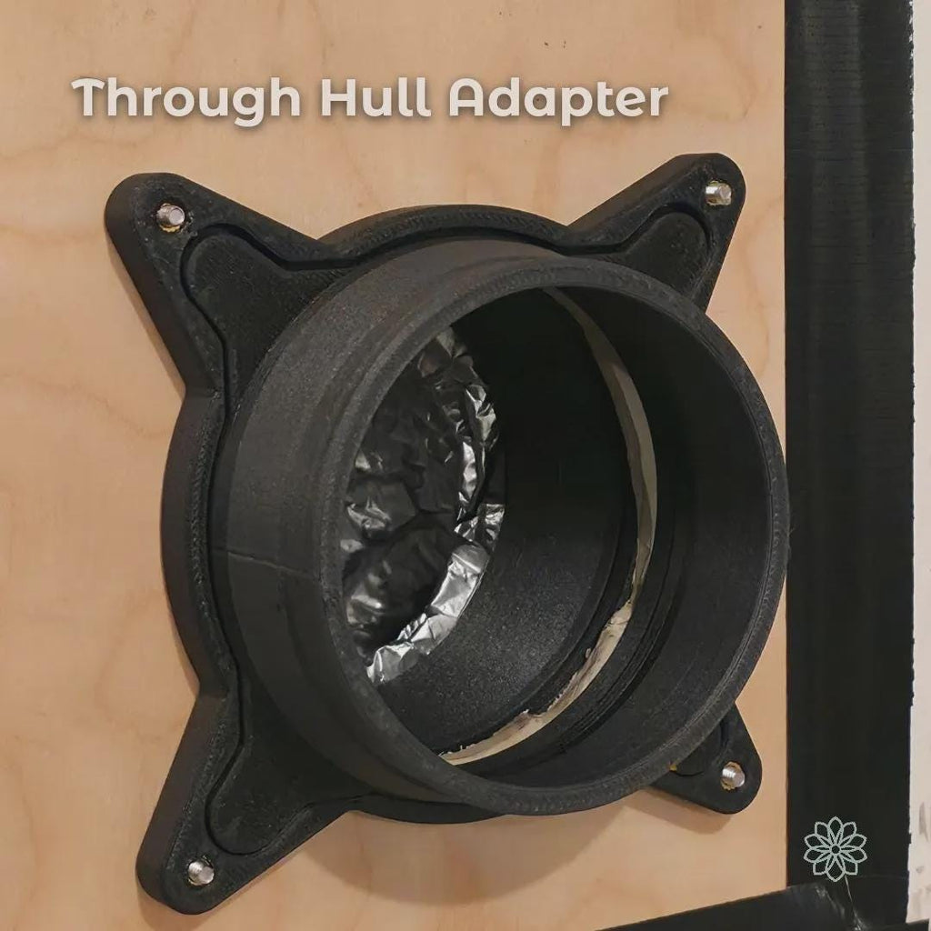 Vent Link through-hull adapter mounted through a panel, showing the circular 4-inch airflow channel and reinforced flange design. The carbon fiber reinforced polycarbonate body provides a stable, aligned pass-through for diesel heater ducting in temporary or modular heating setups. On-image text reads “Through Hull Adapter.”