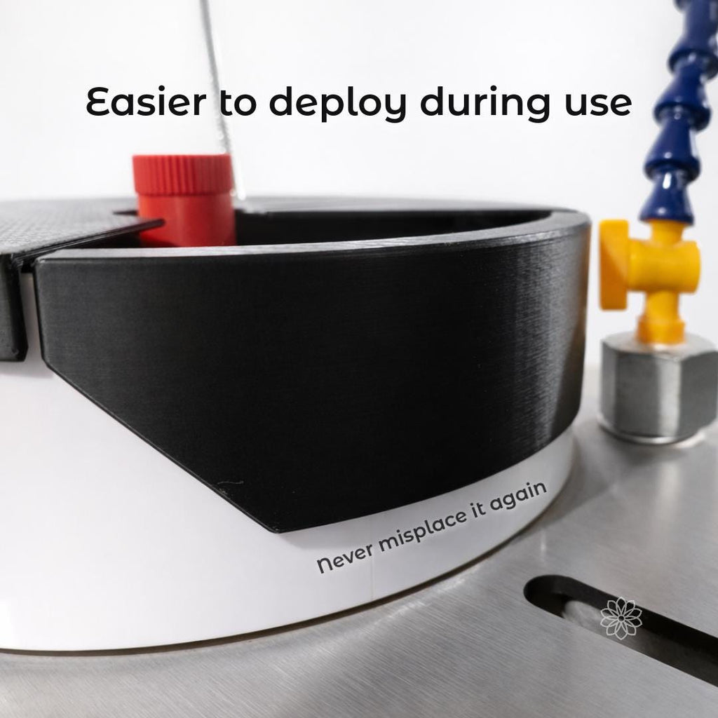 Side view of the upgraded water baffle installed on a Vevor faceting machine, with on-image text reading “Easier to deploy during use” and “never misplace it again.” The curved baffle sits securely in the basin and is shaped for quick installation and removal when switching between flat cuts and faceting operations.