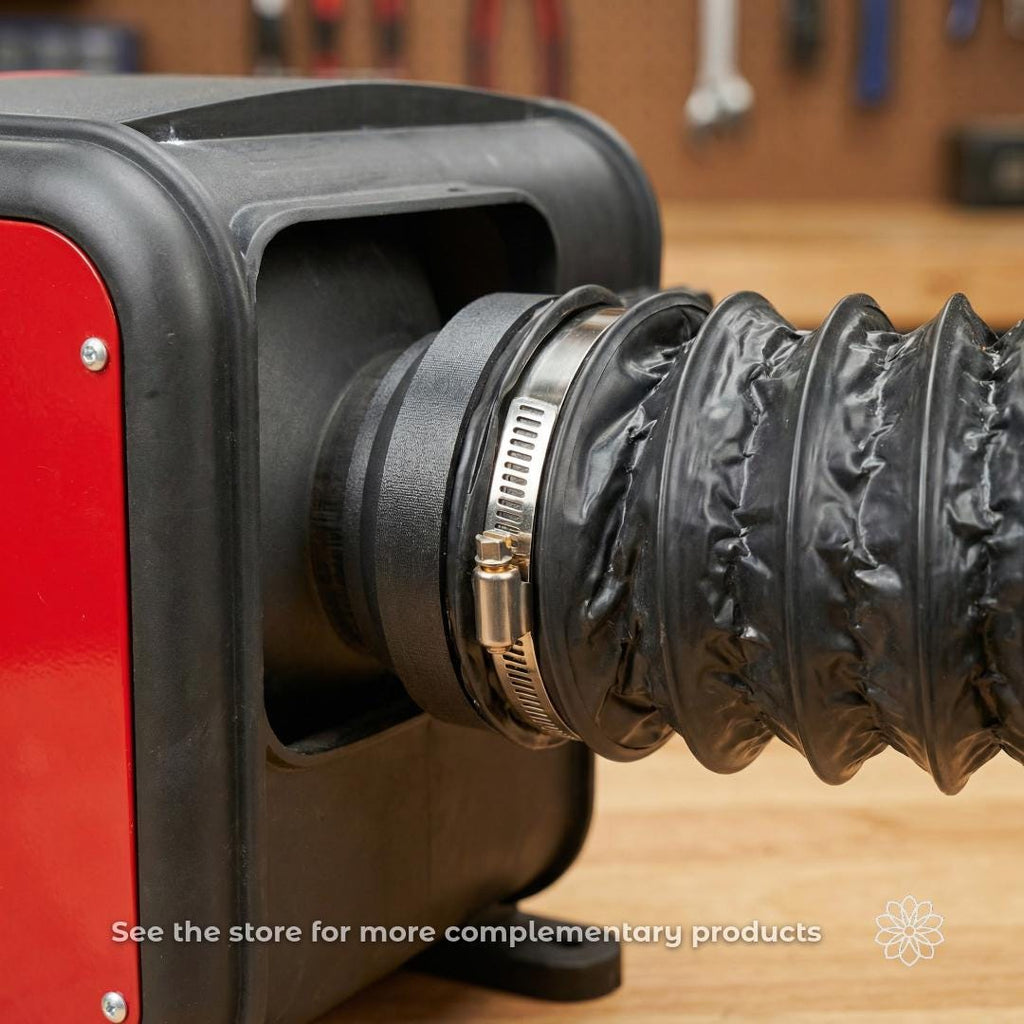 Close-up of a diesel heater outlet connected to a 4 inch flexible duct using the Mag link adapter and hose clamp, demonstrating clean alignment and secure airflow routing. The image reinforces compatibility between Tent Link components and standard diesel heater outputs.