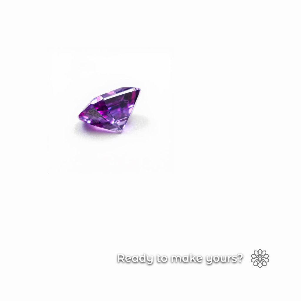 Finished faceted purple alexandrite gemstone displayed on a clean white background, representing the polished result achievable after precise table cutting and faceting work. Overlay text reads “Ready to make yours?” referencing the lapidary tools used to produce professional gemstone facets with consistent geometry.