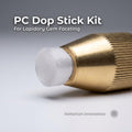Polycarbonate dop stick mounted in a brass faceting machine chuck for lapidary gemstone faceting. Text on image reads “PC Dop Stick Kit – For Lapidary Gem Faceting.” Close-up shows transparent recycled polycarbonate dop used for holding gemstones during faceting and polishing. Aetherium Innovations lapidary tool designed for universal 6 mm faceting quill compatibility.