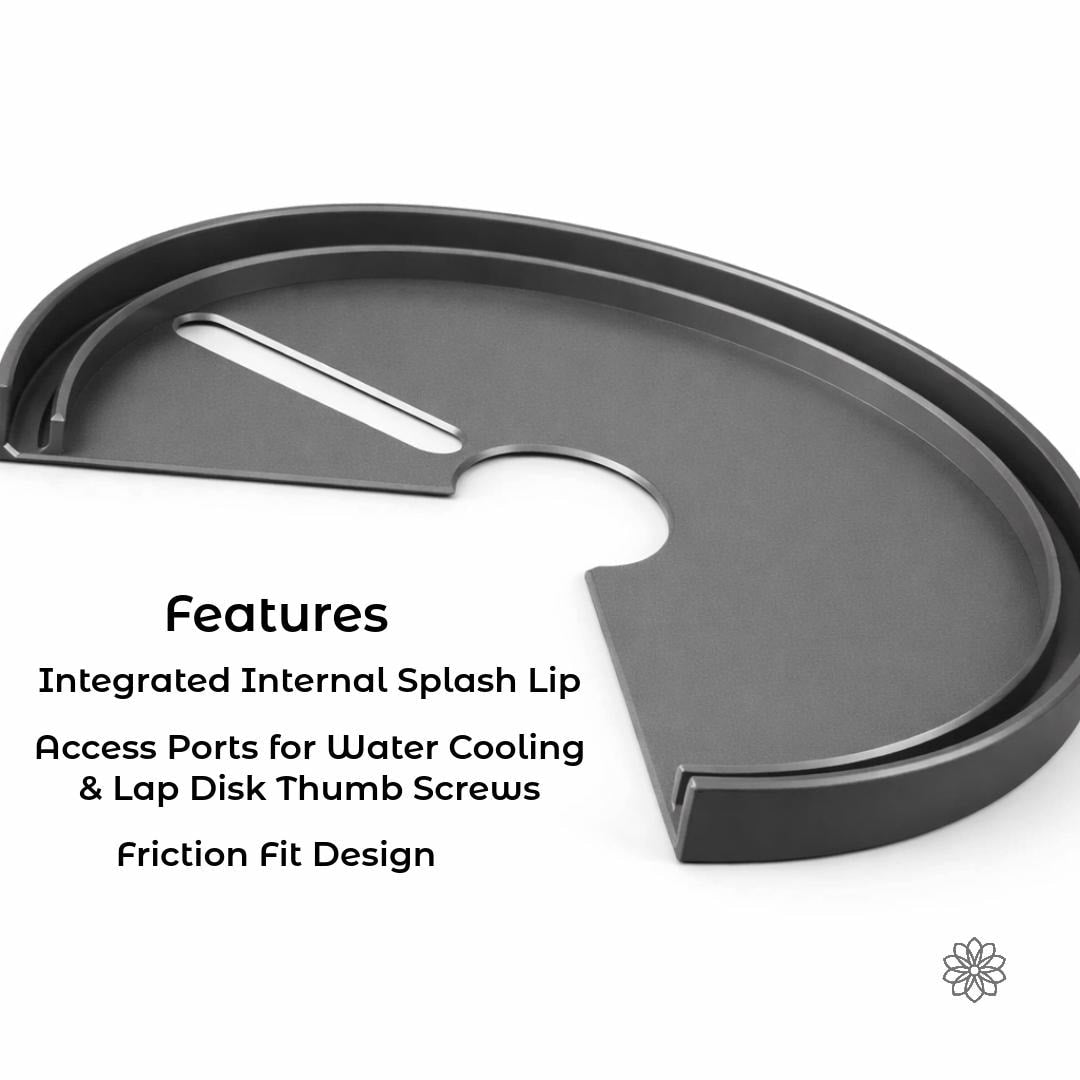 Black lap disk cover shown on a white background with a raised internal splash lip, center cutout, and long access slot. This Vevor faceting machine cover is shaped to fit around the lap and allow access for water cooling and thumb screws. Overlay text reads “Features, Integrated Internal Splash Lip, Access Ports for Water Cooling & Lap Disk Thumb Screws, Friction Fit Design.”