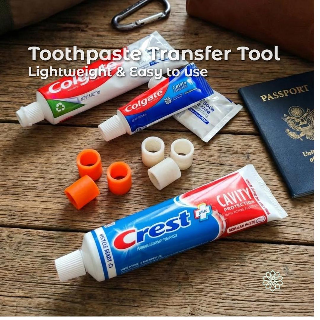 “Crest and Colgate toothpaste tubes arranged on a wooden table beside travel-size tubes, toothpaste refill adapters, and a passport. The image shows both full and miniature tubes with matching adapters to demonstrate compatibility and travel use. Scene suggests packing for flights, camping, or backpacking with lightweight hygiene tools.”