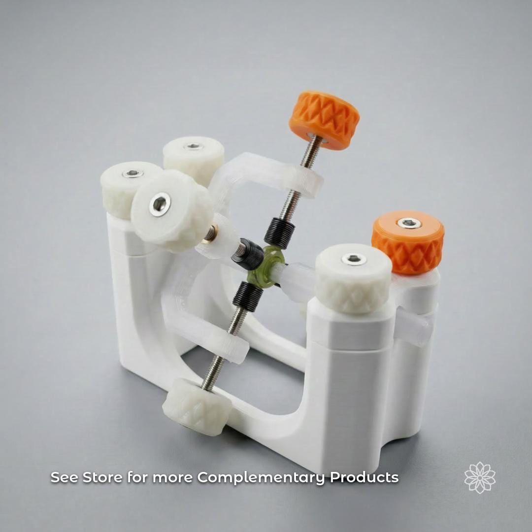Gemstone transfer jig holding a dop stick with an epoxy-mounted green peridot gemstone between alignment screws. Text on image reads “See Store for more Complementary Products.” Example of lapidary setup used for transferring stones between dop sticks during faceting. Compatible with 6 mm dop systems used on Vevor and similar faceting machines.