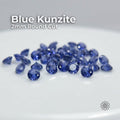 Image showing rows of 2 mm lab-grown blue kunzite stones arranged on a measurement grid for size reference. The gemstones display consistent round cuts, uniform spacing, and a blue-violet color tone. Overlay text reads “Need a special size?” highlighting availability for custom sizing and calibrated stone selection for precision jewelry applications.