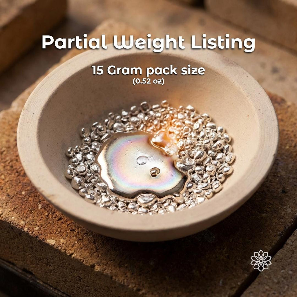 Silver casting grain in a ceramic dish showing a 15 gram pack size with partially melted silver forming a reflective pool, text overlay reads “Partial Weight Listing 15 Gram pack size (0.52 oz),” visual reference for small batch jewelry casting material and controlled silver quantity