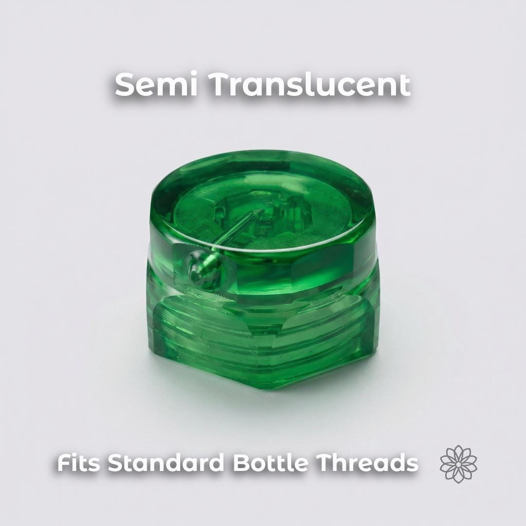 Close-up of translucent green ultralight bidet cap showing internal channel design and threading. Bottle cap rinse nozzle compatible with standard 28mm water bottles. designed for controlled water flow and leak-resistant sealing for backpacking hygiene.