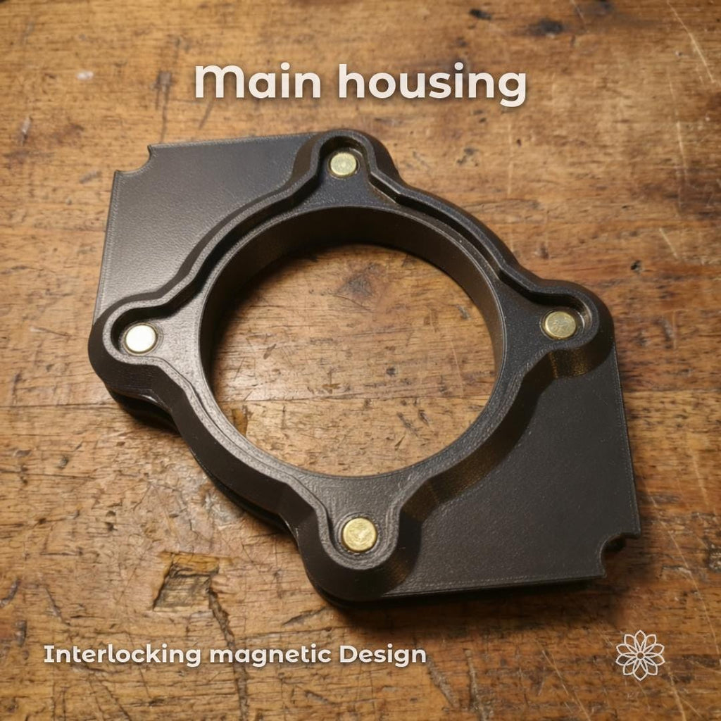 Main housing of Tent Link heater port system with interlocking magnetic design, circular duct opening with reinforced mounting points, carbon fiber composite construction for durability and repeated seasonal use in tent heating applications.