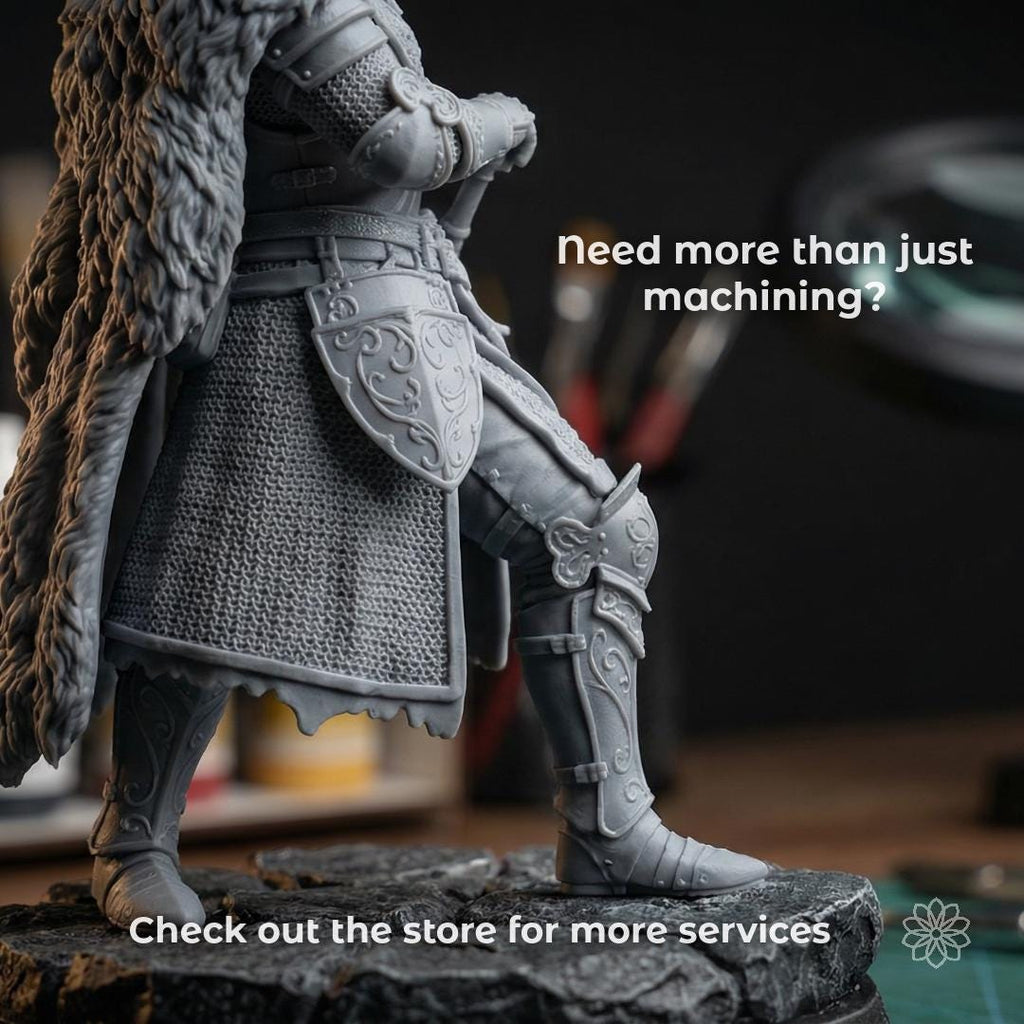 Highly detailed sculpted figurine showing a cloaked warrior with textured armor, chainmail, and ornamental carving, demonstrating fine surface resolution and complex geometry reproduction. Overlay text reads “Need more than just machining? Check out the store for more services.” Image signals extended capabilities including high-detail prototyping, model refinement, and finishing workflows beyond basic CNC cutting.