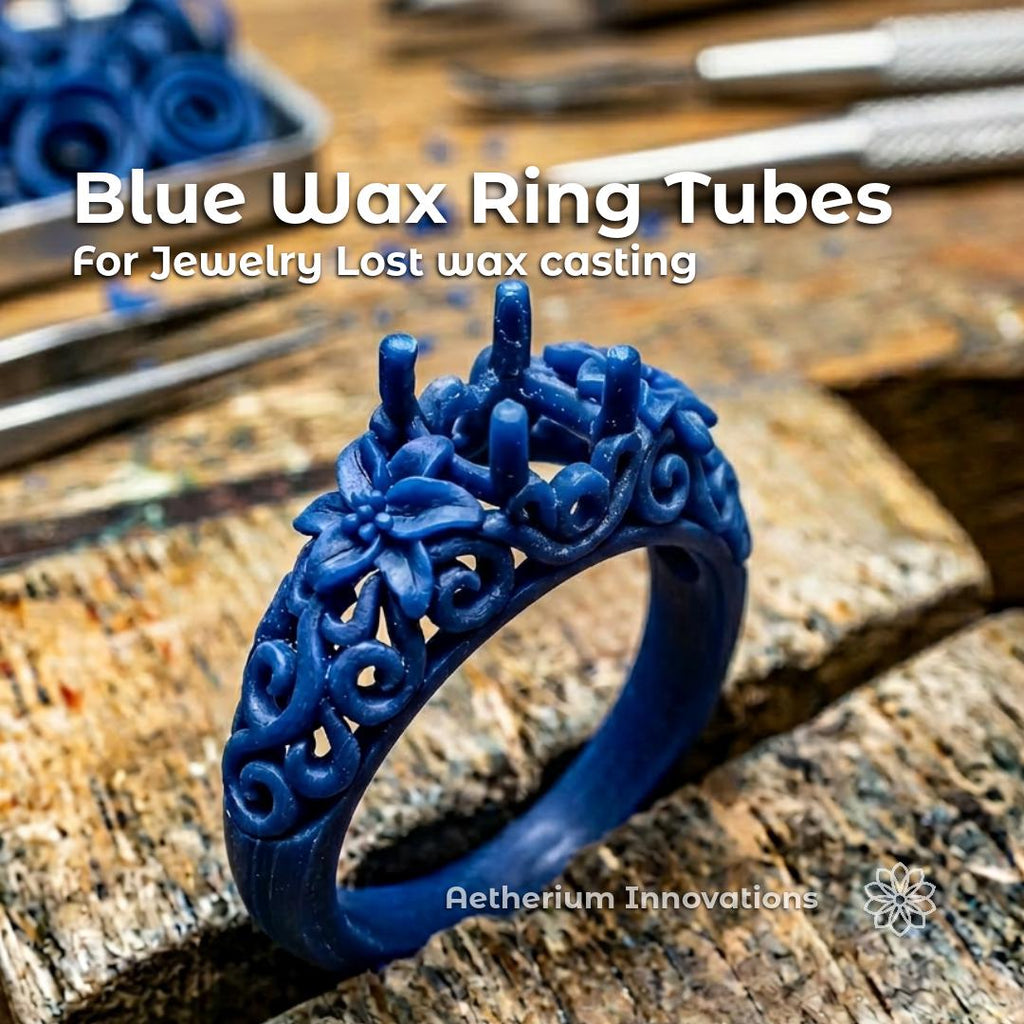 Blue wax ring tubes for jewelry carving and lost wax casting shown as an intricate hand-carved floral wax ring on a worn jeweler’s bench with carving tools blurred in the background. The image demonstrates the level of detail possible with carving wax for custom rings, signet rings, and casting prototypes. Text reads “Blue Wax Ring Tubes For Jewelry Lost wax casting.” Aetherium Innovations branding and flower logo appear near the bottom right.