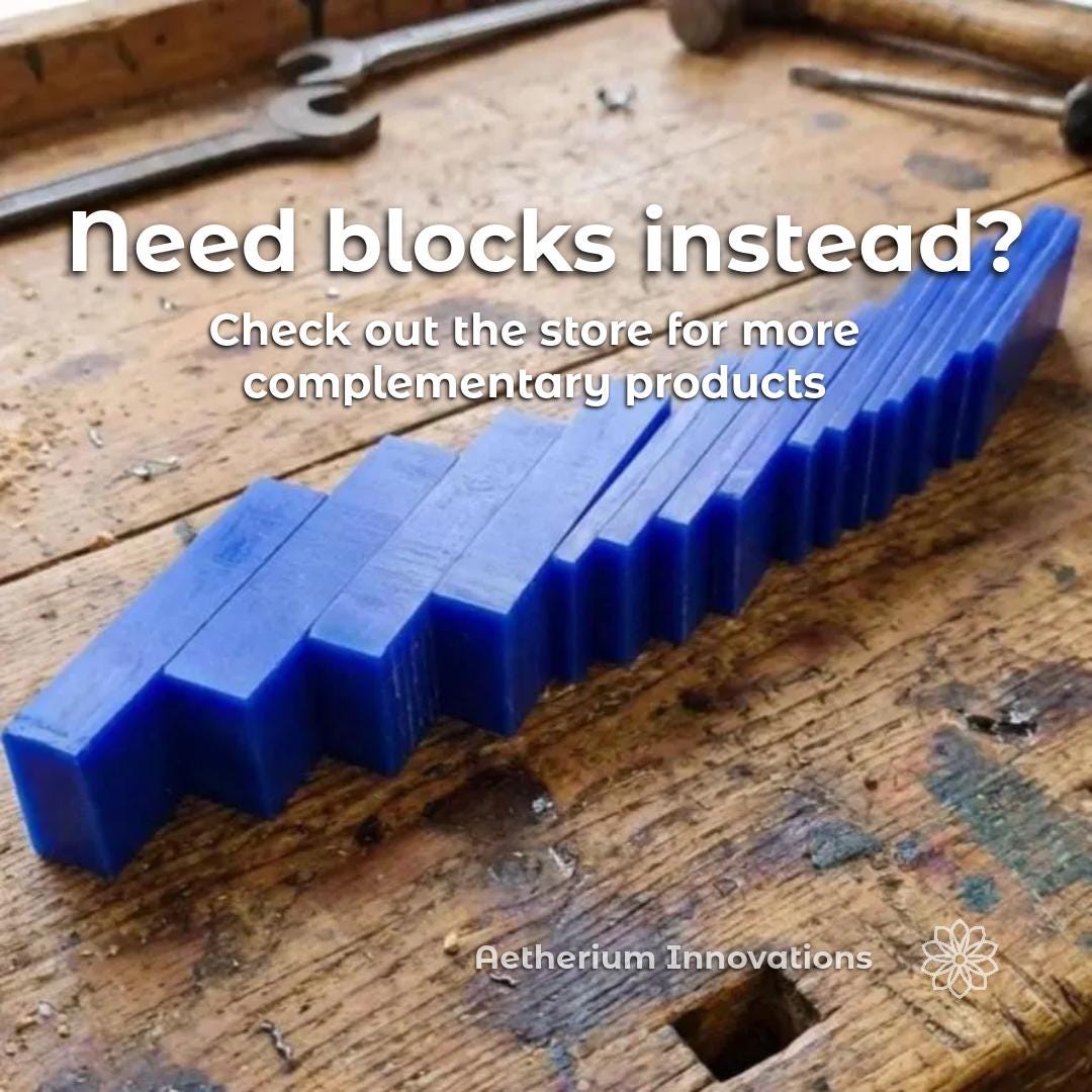 Blue jewelry carving wax blocks arranged on a worn jeweler’s workbench with metalworking tools in the background, showing additional carving wax supplies available from Aetherium Innovations. The image promotes complementary wax materials for lost wax casting, jewelry carving, CNC prototyping, signet ring carving, and custom jewelry fabrication workflows. Text reads “need blocks instead? Check out the store for more complementary products.”