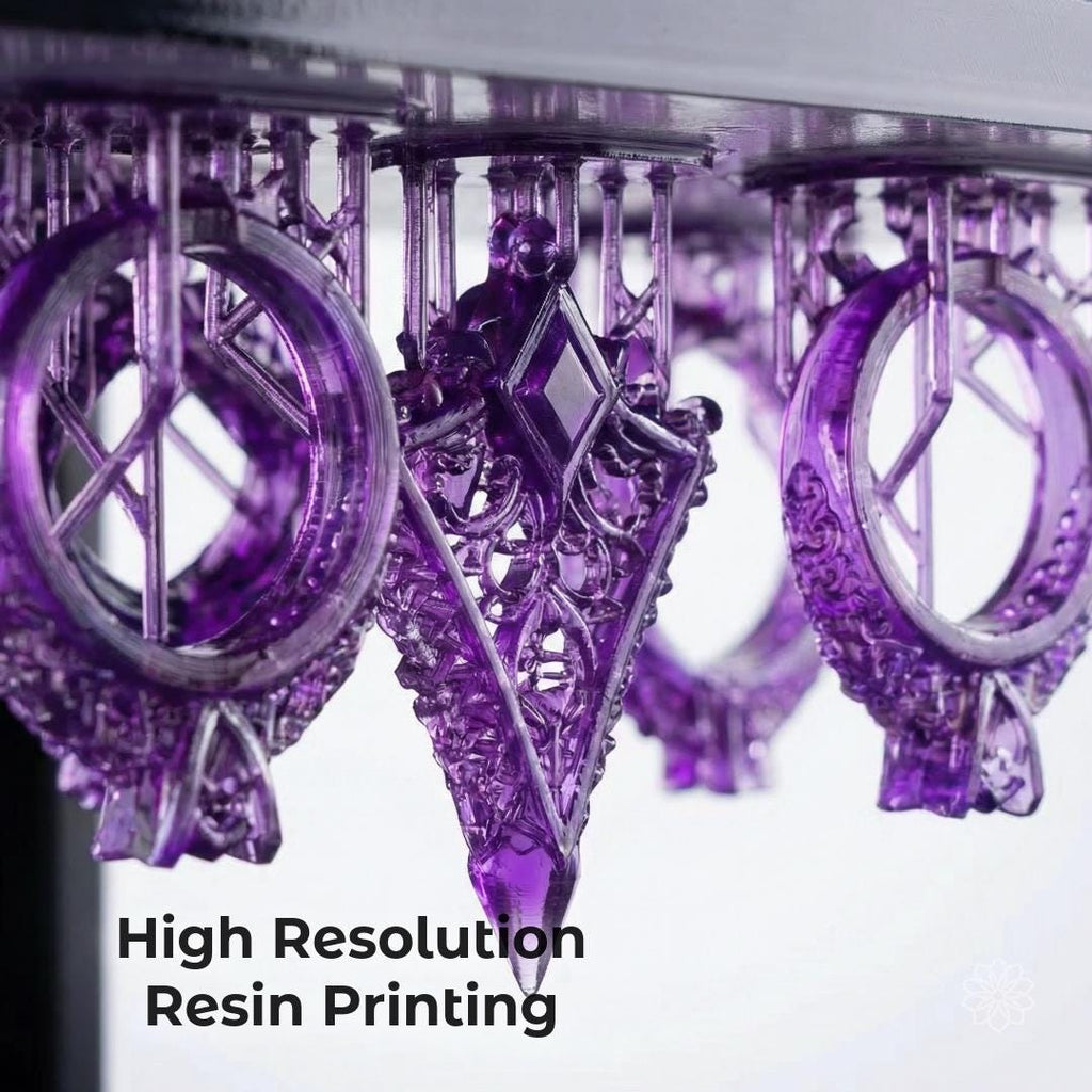 Detailed resin jewelry components suspended on a build platform during printing. Overlay text reads "High Resolution Resin Printing." This image demonstrates precision additive manufacturing for jewelry masters, prototype validation, highly detailed replacement parts, product development, engineering models, and casting-ready production components.