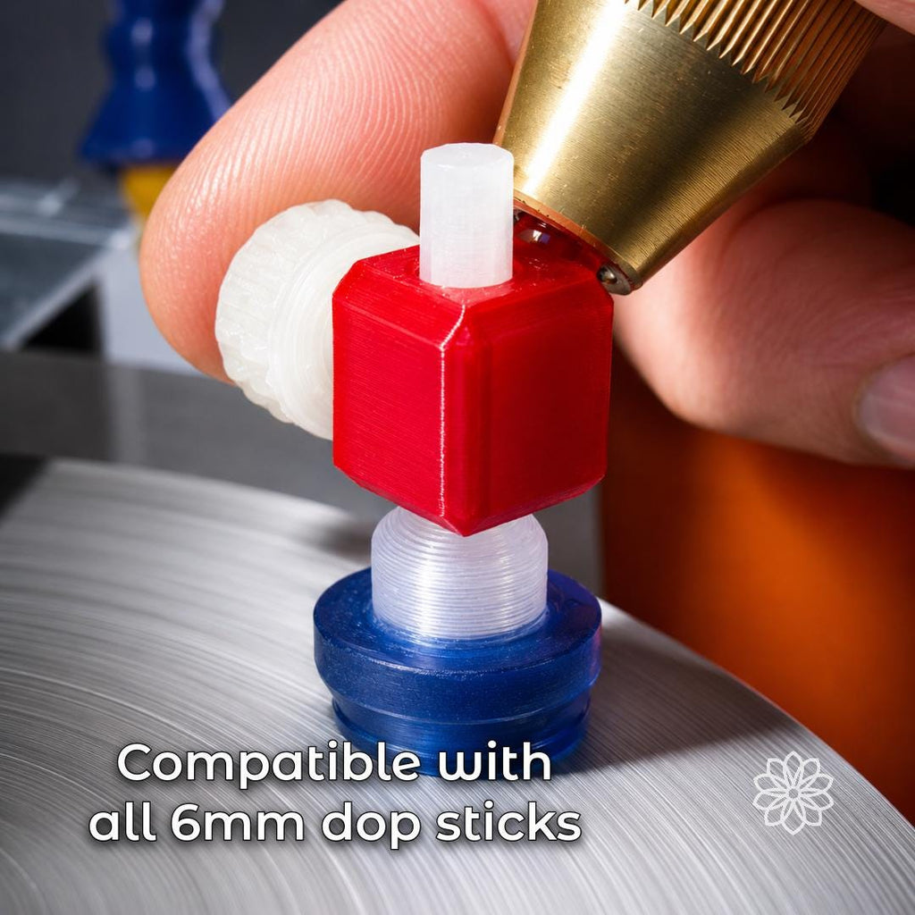 Close-up of a 45 degree tabling adapter holding a white 6 mm dop stick under a brass faceting quill. Compatible lapidary adapter for standard dop sticks, gemstone table cutting, VEVOR faceting machine upgrades, and precision faceting.
