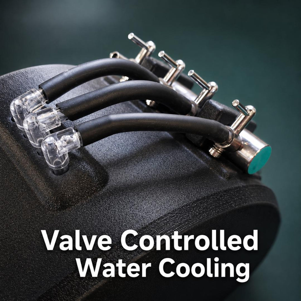 Valve-controlled water cooling manifold on the Cut n’ Cab V2 MakerSpace Edition, with black hoses, clear fittings, and metal valves mounted to the wet grinder housing for controlled water flow during cutting and grinding.