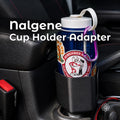 Nalgene cup holder adapter installed in a Jeep center console, holding a blue 32oz wide-mouth Nalgene bottle in a black carbon fiber polymer holder designed for larger outdoor water bottles. Durable enough for trail use.