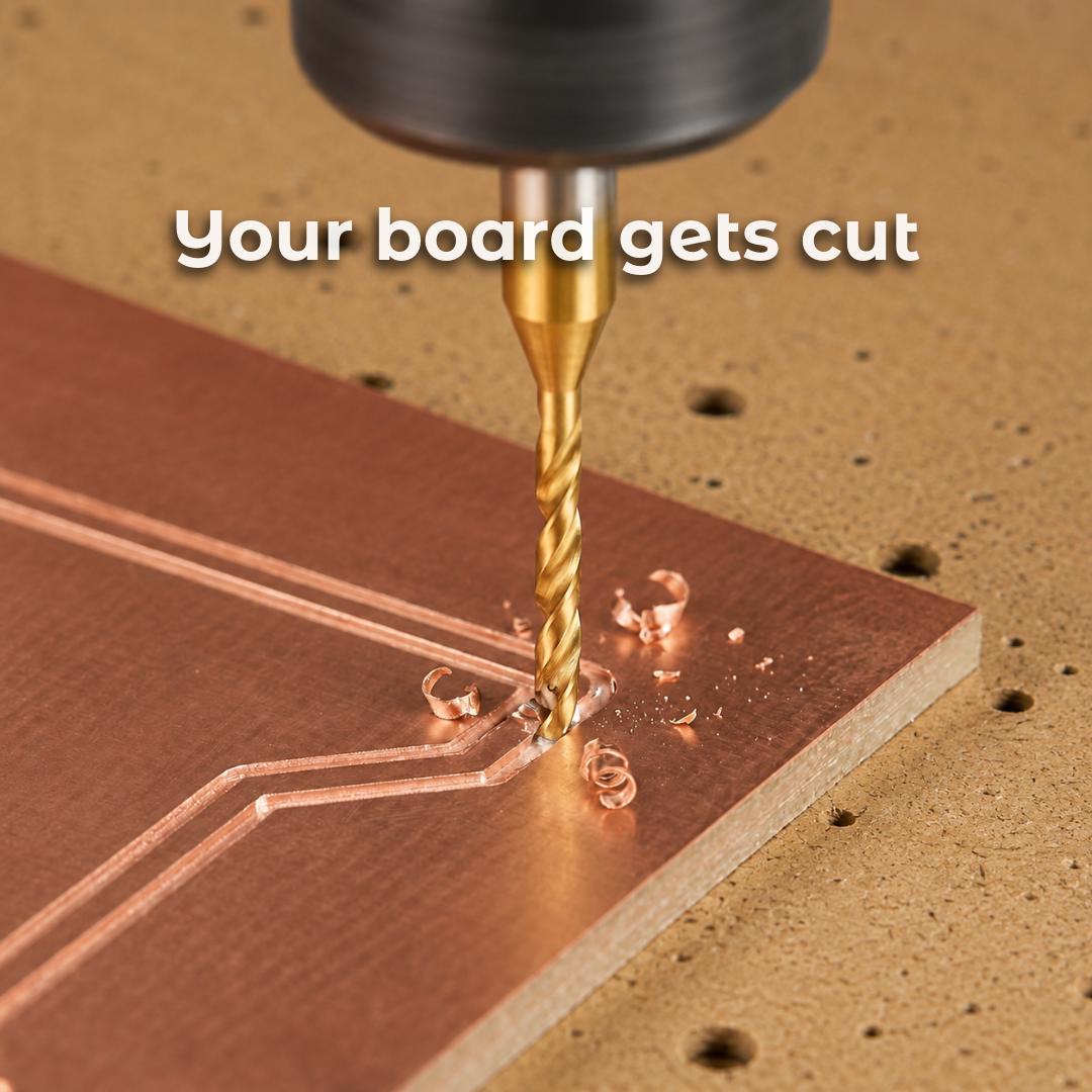 Close-up of a CNC end mill drilling and routing a copper-clad circuit board, showing precision PCB trace machining, isolation routing, through-hole drilling, and small-run electronics prototyping.
Bare-board scope