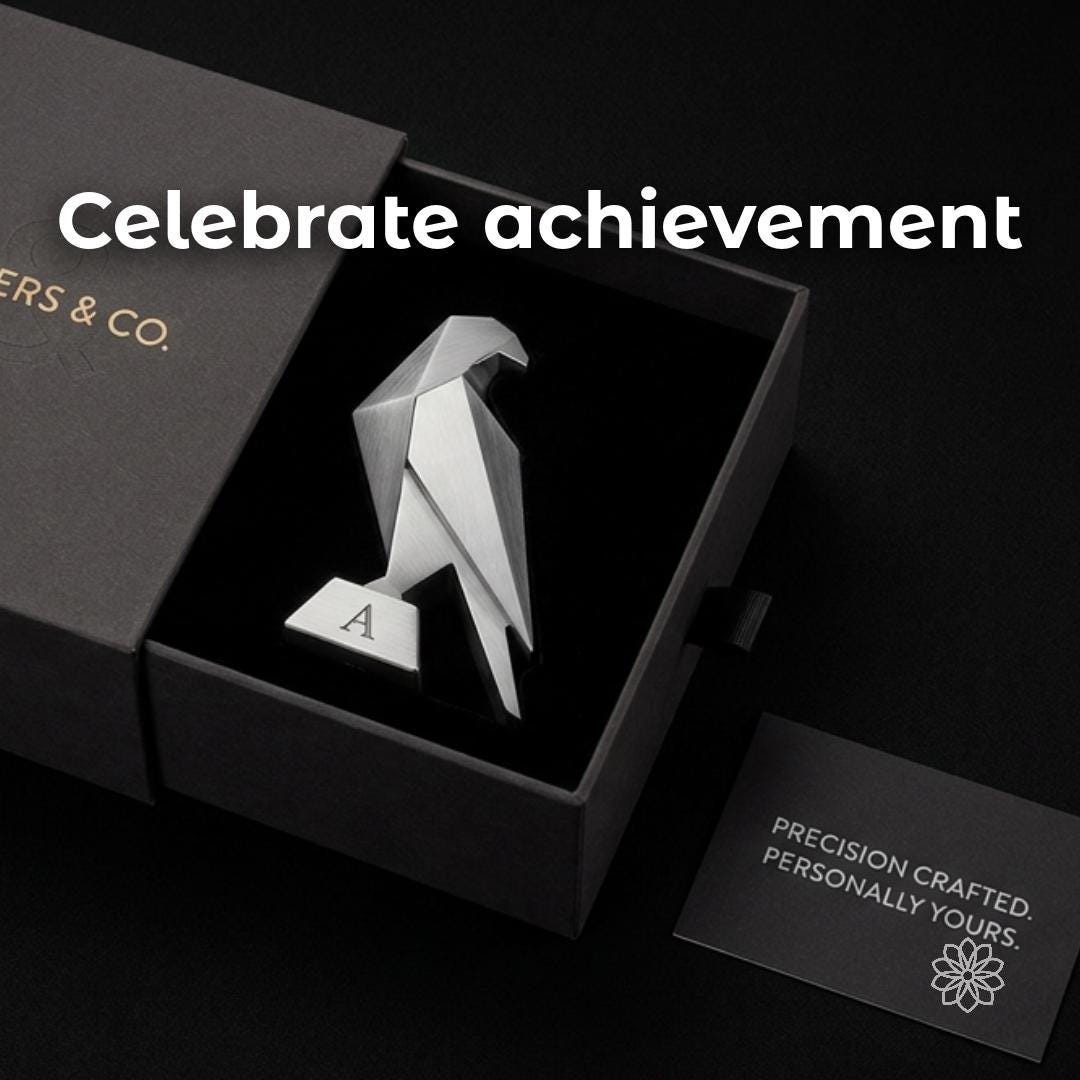 Minimalist geometric metal award displayed in a luxury presentation box with premium packaging and presentation card. Modern executive award concept showcasing custom manufacturing, industrial design, bespoke recognition gifts, employee appreciation, corporate awards, leadership milestones, precision fabrication, CNC machining, and premium business branding by Aetherium Innovations.