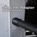 Makera Carvera Air shop-vac adapter with black 3D-printed construction, installed between the desktop CNC machine's rear dust port and a vacuum hose for external chip and dust collection.