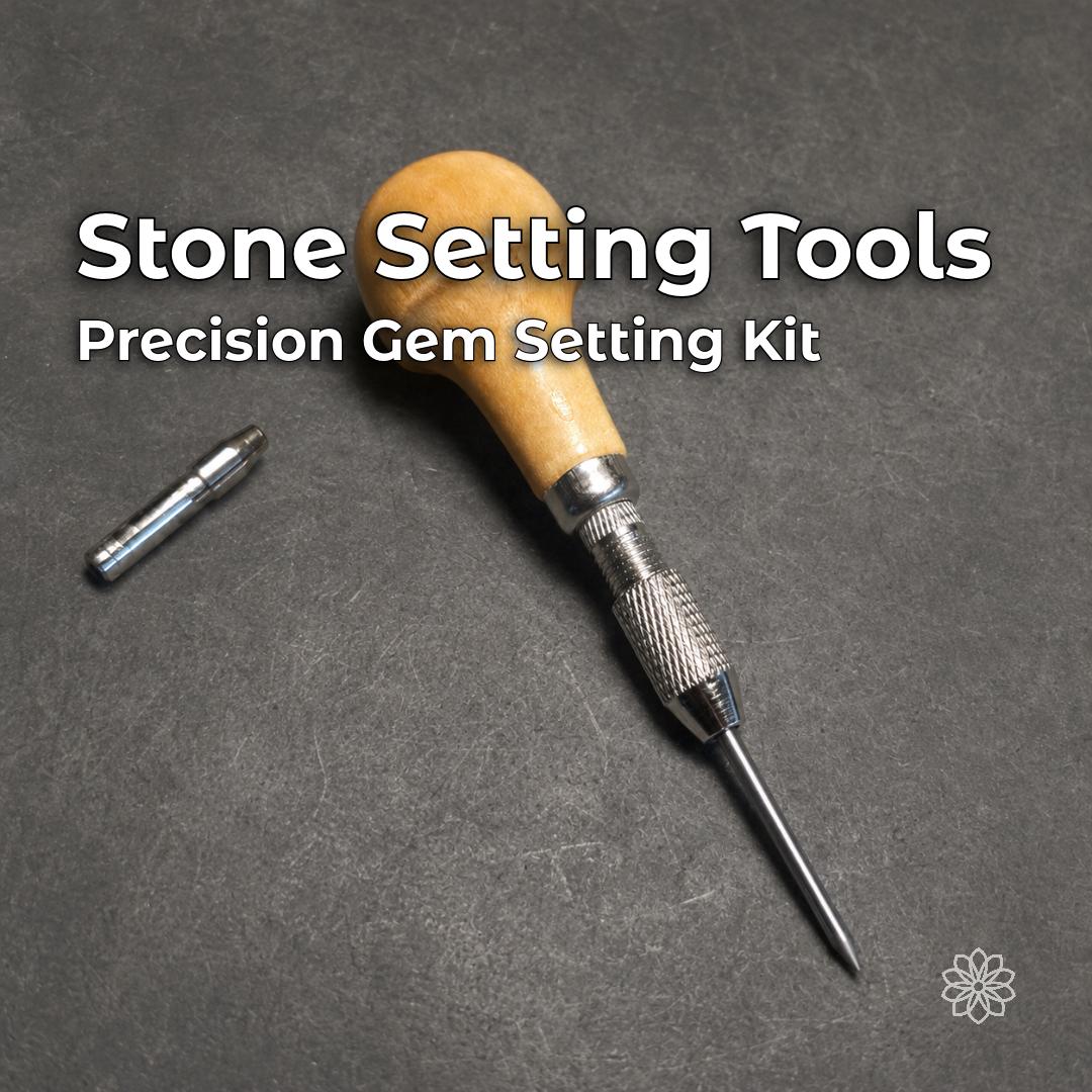 Wooden-handled stone setting tool with knurled chuck, pointed setting tip, and loose adapter collet on a white work surface
