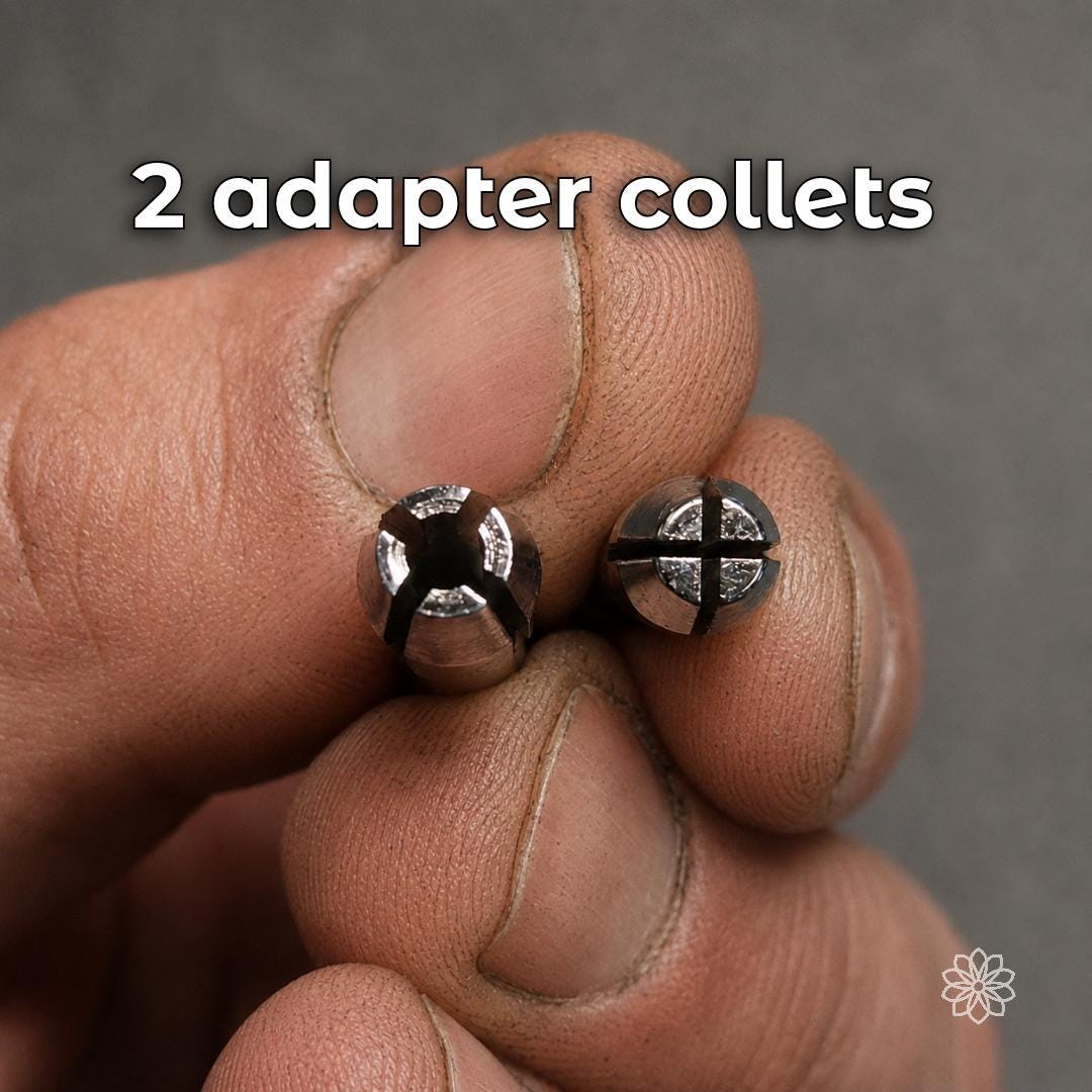 Two split metal adapter collets for fitting interchangeable stone setting points into the wooden-handled holder