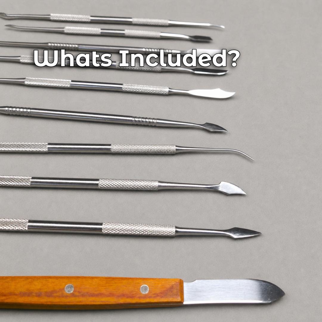 Assorted curved, pointed, spoon, blade, and spatula ends from the jewelry wax carving set beside the separate wooden-handled wax knife