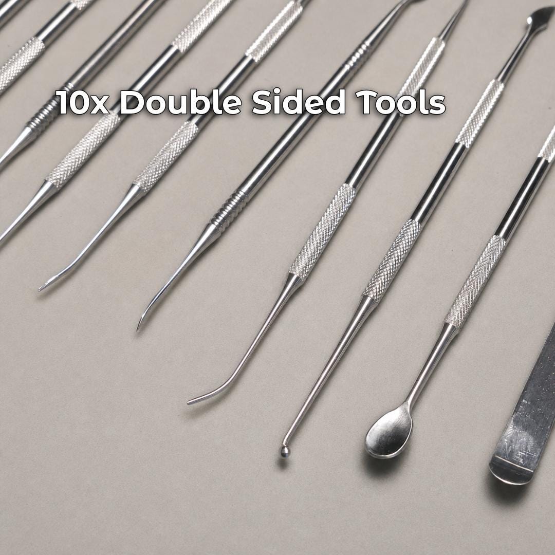 Ten double-ended metal wax and clay carving instruments showing knurled grips and varied fine-detail working profiles