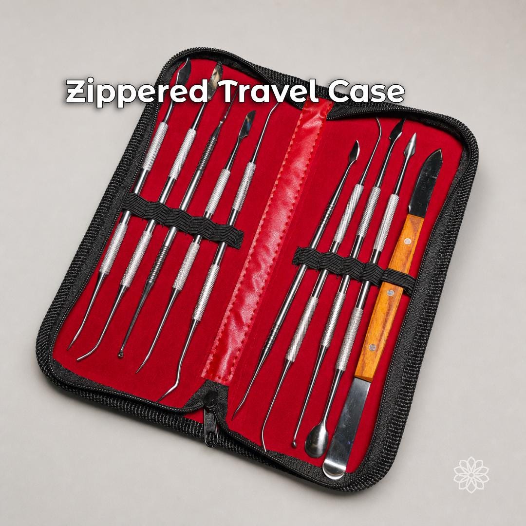 Complete jewelry wax carving set secured by elastic retainers inside the open black zippered travel case with red lining